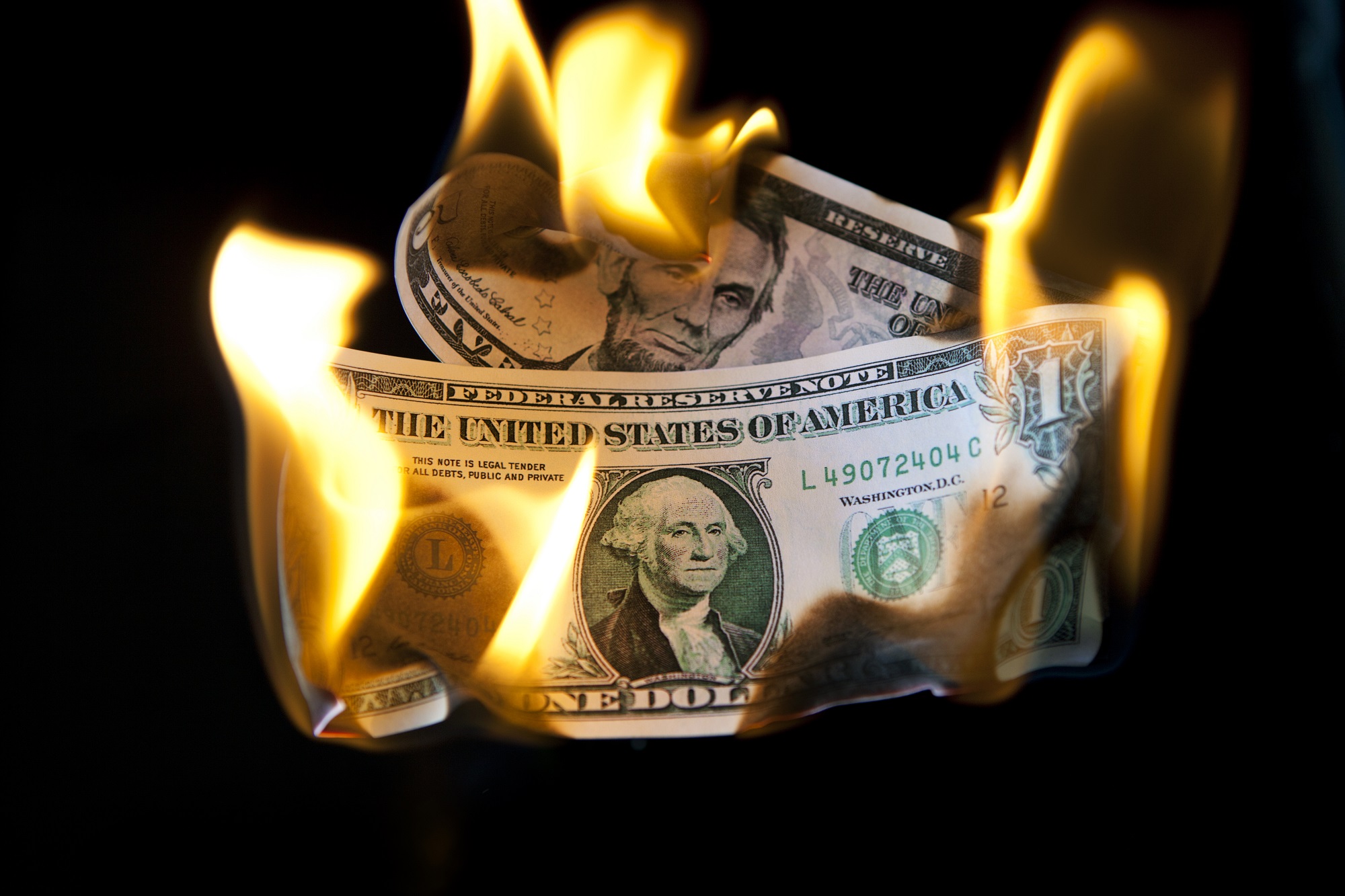 Dollar bills on fire