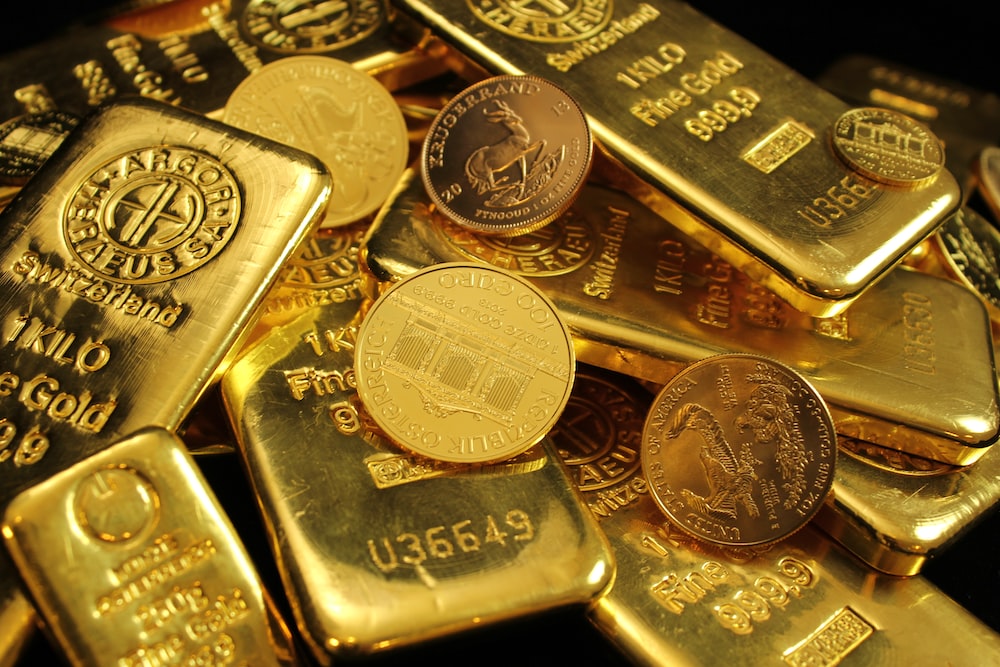 Image of gold coins and bars