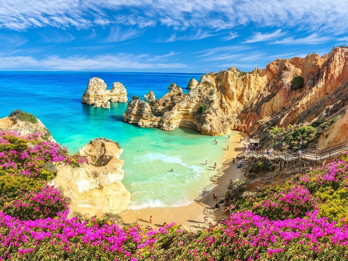A beach in Portugal's Algarve, where living abroad is the path to a better life, on sale.